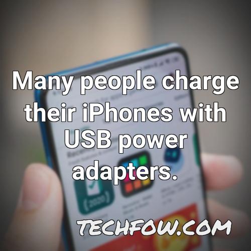 many people charge their iphones with usb power adapters