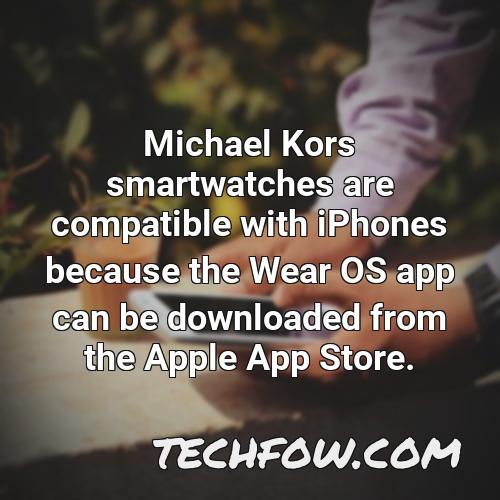 michael kors smartwatches are compatible with iphones because the wear os app can be downloaded from the apple app store