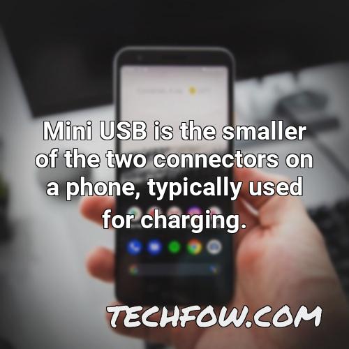 mini usb is the smaller of the two connectors on a phone typically used for charging