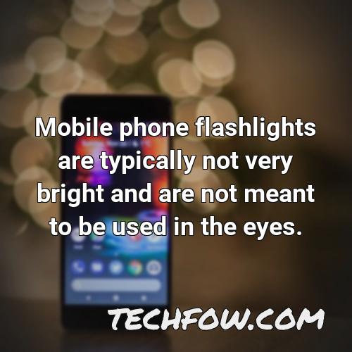 mobile phone flashlights are typically not very bright and are not meant to be used in the eyes
