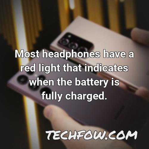 most headphones have a red light that indicates when the battery is fully charged