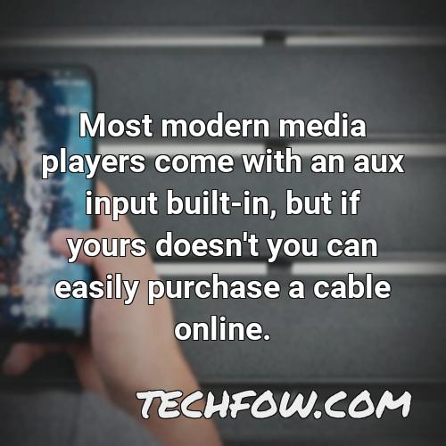 most modern media players come with an aux input built in but if yours doesn t you can easily purchase a cable online