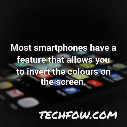 most smartphones have a feature that allows you to invert the colours on the screen