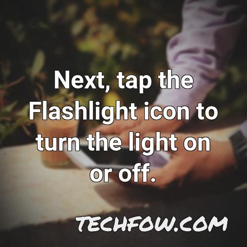 next tap the flashlight icon to turn the light on or off