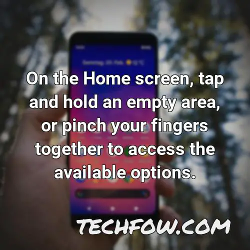 on the home screen tap and hold an empty area or pinch your fingers together to access the available options