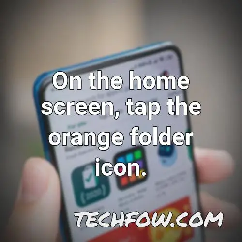 on the home screen tap the orange folder icon