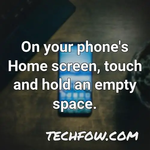 on your phone s home screen touch and hold an empty space 1