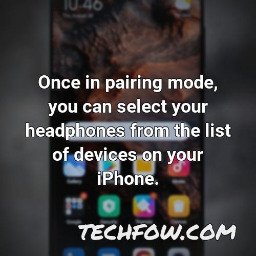 once in pairing mode you can select your headphones from the list of devices on your iphone