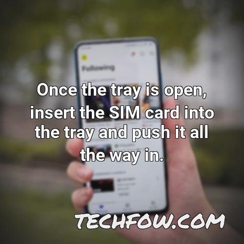 once the tray is open insert the sim card into the tray and push it all the way in