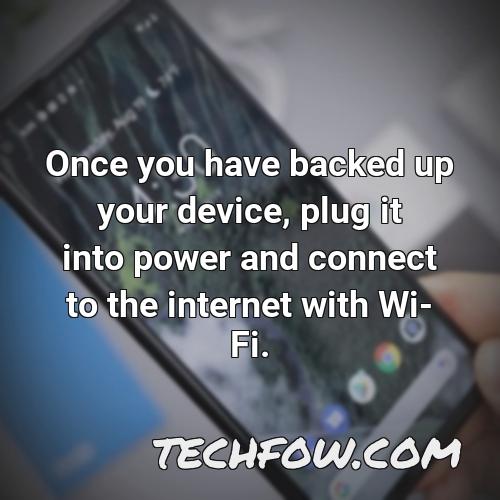 once you have backed up your device plug it into power and connect to the internet with wi fi