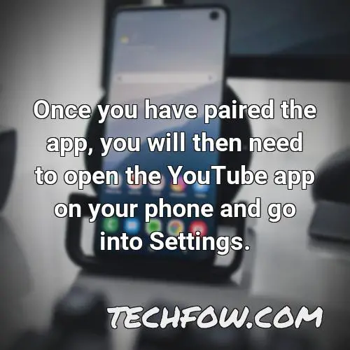 once you have paired the app you will then need to open the youtube app on your phone and go into settings