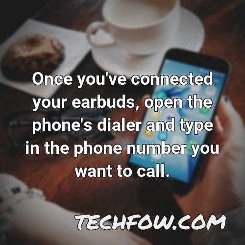 once you ve connected your earbuds open the phone s dialer and type in the phone number you want to call