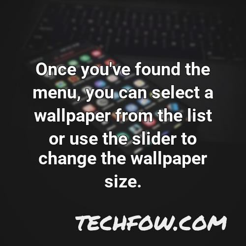 once you ve found the menu you can select a wallpaper from the list or use the slider to change the wallpaper size