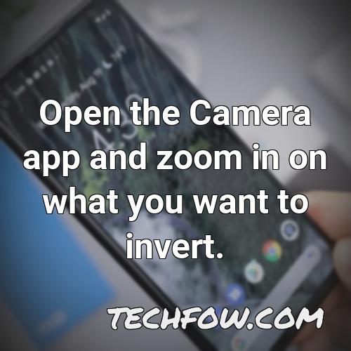 open the camera app and zoom in on what you want to invert