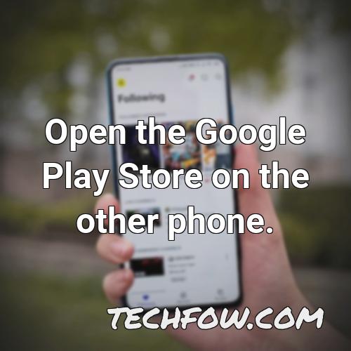 open the google play store on the other phone