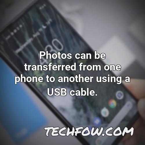 photos can be transferred from one phone to another using a usb cable