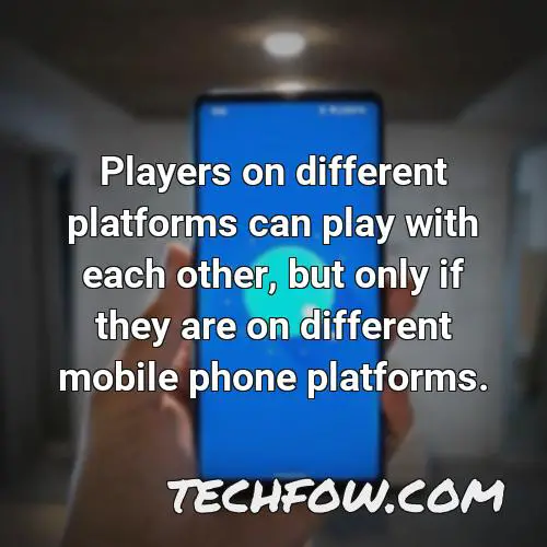 players on different platforms can play with each other but only if they are on different mobile phone platforms