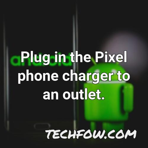 plug in the pixel phone charger to an outlet