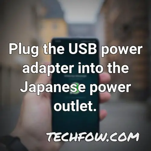 plug the usb power adapter into the japanese power outlet