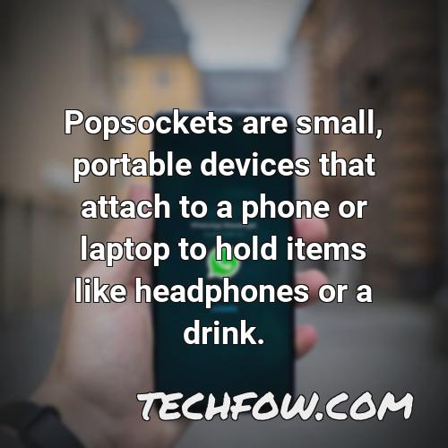popsockets are small portable devices that attach to a phone or laptop to hold items like headphones or a drink
