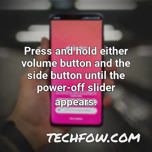 press and hold either volume button and the side button until the power off slider appears