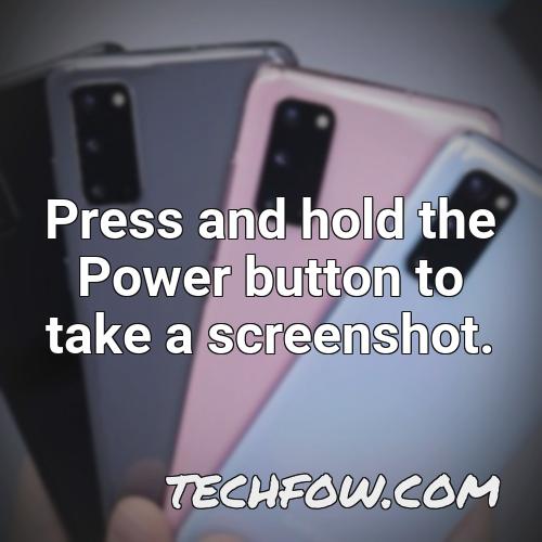 press and hold the power button to take a screenshot