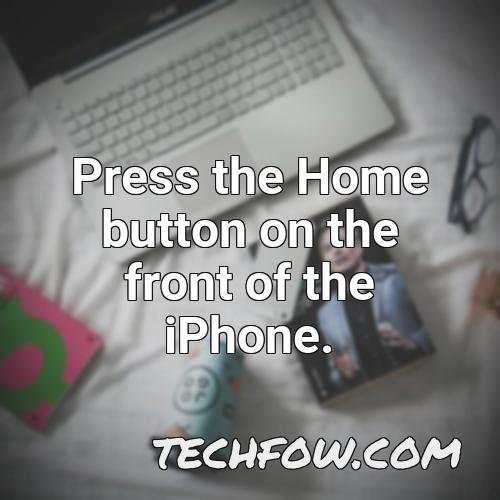 press the home button on the front of the iphone