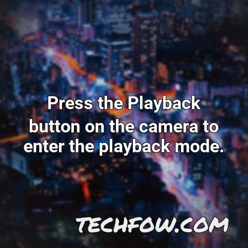 press the playback button on the camera to enter the playback mode