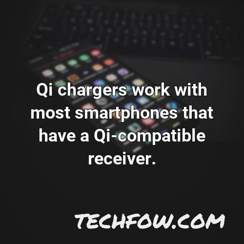 qi chargers work with most smartphones that have a qi compatible receiver