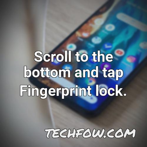 scroll to the bottom and tap fingerprint lock