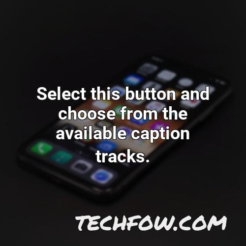 select this button and choose from the available caption tracks