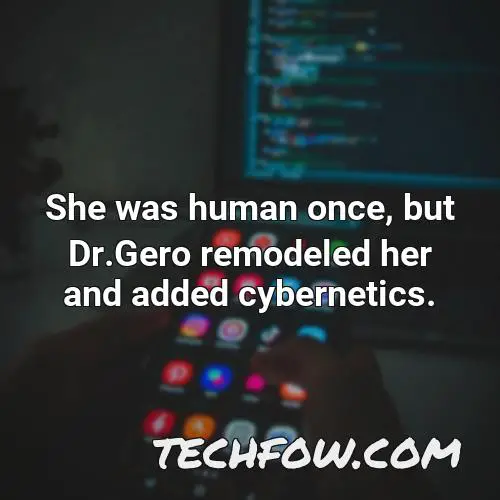 she was human once but dr gero remodeled her and added cybernetics 2
