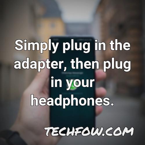 simply plug in the adapter then plug in your headphones