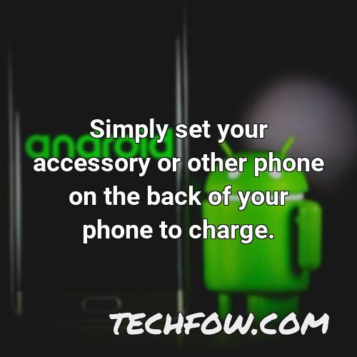 simply set your accessory or other phone on the back of your phone to charge