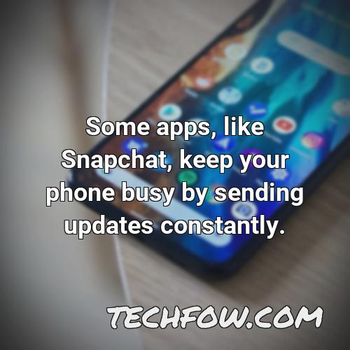 some apps like snapchat keep your phone busy by sending updates constantly