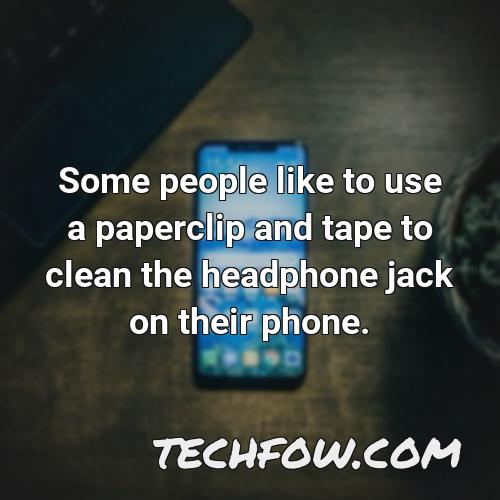 some people like to use a paperclip and tape to clean the headphone jack on their phone