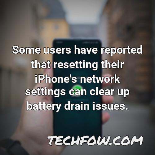 some users have reported that resetting their iphone s network settings can clear up battery drain issues