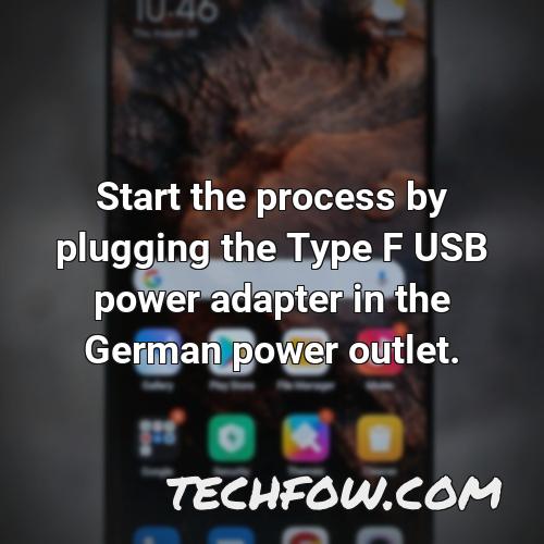 start the process by plugging the type f usb power adapter in the german power outlet