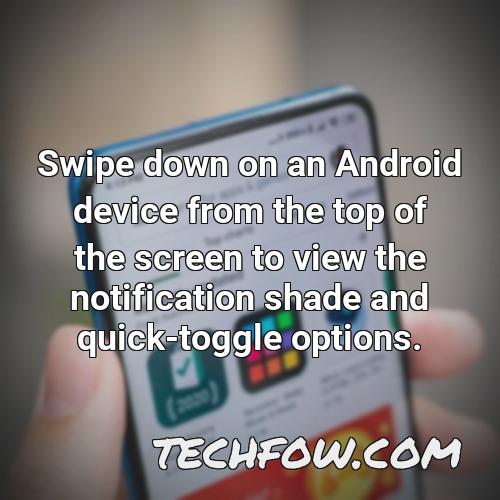 swipe down on an android device from the top of the screen to view the notification shade and quick toggle options