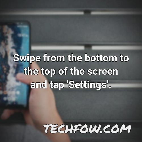 swipe from the bottom to the top of the screen and tap settings