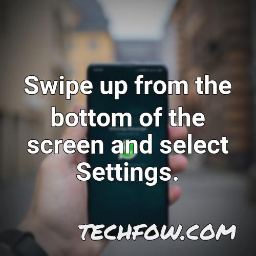 swipe up from the bottom of the screen and select settings 1