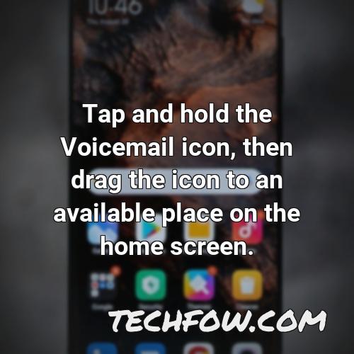 tap and hold the voicemail icon then drag the icon to an available place on the home screen