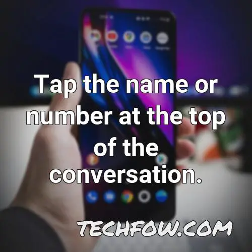 tap the name or number at the top of the conversation
