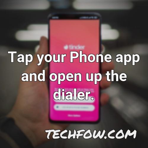 tap your phone app and open up the dialer 1