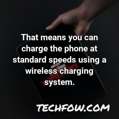 that means you can charge the phone at standard speeds using a wireless charging system 1