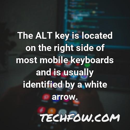 the alt key is located on the right side of most mobile keyboards and is usually identified by a white arrow