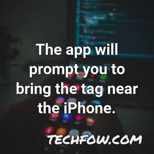 the app will prompt you to bring the tag near the iphone