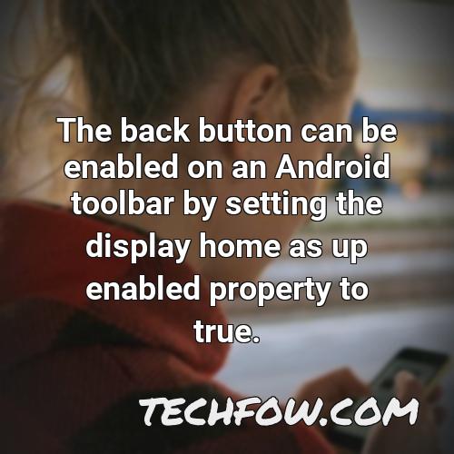 the back button can be enabled on an android toolbar by setting the display home as up enabled property to true