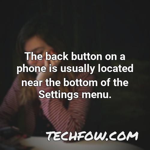 the back button on a phone is usually located near the bottom of the settings menu