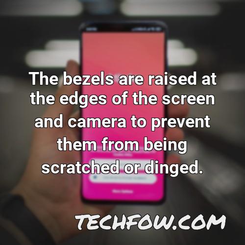 the bezels are raised at the edges of the screen and camera to prevent them from being scratched or dinged